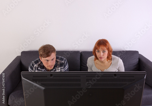 Photo: Das junge Paar auf dem Sofa Das junge Paar auf dem Sofa