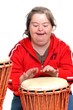 down syndrome woman with djembe down syndrome woman with djembe