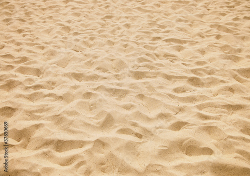 Foto: texture of yellow sand on the beach texture of yellow sand on the beach