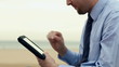 Video: Young businessman with tablet computer, outdoors Young businessman with tablet computer, outdoors