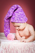 beautiful baby in knitted cap