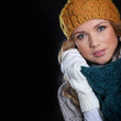 Portrait of beautiful woman wearing winter accessories