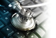 Medical Stethoscope on Keyboard