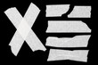 Assorted masking tape stripes isolated on black Assorted masking tape stripes isolated on black