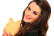 Happy woman with her savings in a piggy bank Happy woman with her savings in a piggy bank