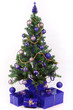 Beautiful Christmas tree with present and decorations