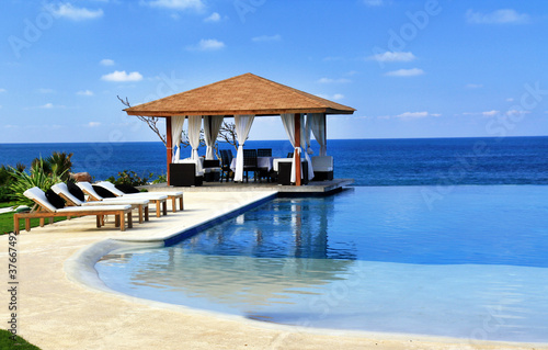 Photo: Pavilion and swimming pool in resort Pavilion and swimming pool in resort