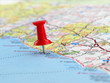 Clouseup of red pushpin on the map