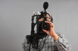 Man with HD SLR camera and audio equipment