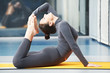 Happy smiling woman at gymnastic fitness exercise
