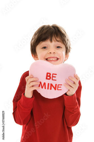 Photo: Child with Valentine's Day heart pillow Child with Valentine's Day heart pillow