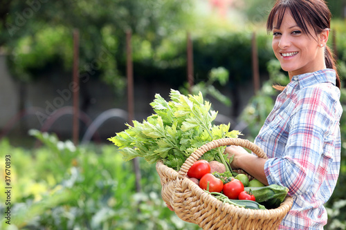 Photo: Woman in her vegetable garden Woman in her vegetable garden