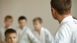 Martial arts instructor training children