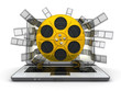 laptop and gold spool