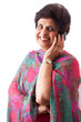 Foto: Elderly East Indian Lady talking on Cellphone Elderly East Indian Lady talking on Cellphone