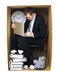 Photo: Businessman in a tight office Businessman in a tight office