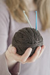 Photo: Ball of yarn and crochet needles Ball of yarn and crochet needles