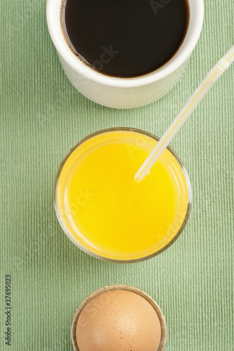 Photo: Breakfast with egg, orange juice and coffee Breakfast with egg, orange juice and coffee