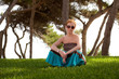 girl sitting on green grass girl sitting on green grass