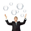Man catching bubbles
