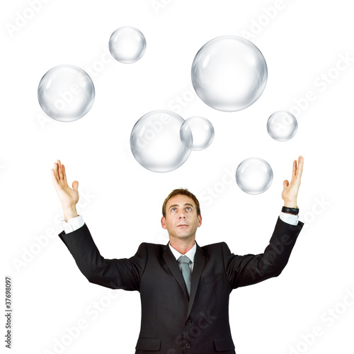 Photo: Man catching bubbles Man catching bubbles