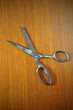 old scissor on wood background