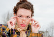 woman in spectacles on a walk in the park