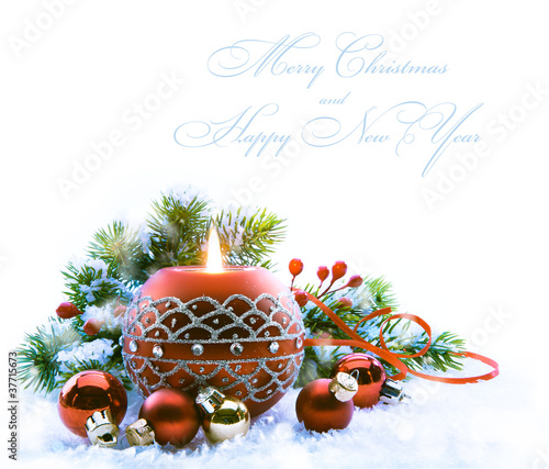 Photo: Christmas greeting card with Christmas Decorations on white bac Christmas greeting card with Christmas Decorations on white bac