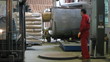 Forklift Truck Lifting Pallet at Warehouse