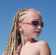 The girl in pink glasses with the African plaits. A portrait