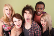 Photo: Angry urban teens shout at the camera. Angry urban teens shout at the camera.