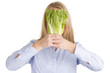 Blonde Woman Holding Salad Lettuce over Face
