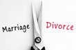 Photo: Marriage and Divorce words with scissors in middle Marriage and Divorce words with scissors in middle