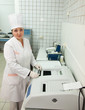 Doctor working with Biochemistry Analyzer