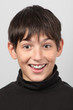 Portrait of smiling boy with surprised look on his face