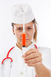 Doctor holding syringe