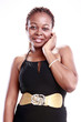Cute Caribbean young woman in little black dress