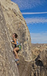 Climber gripping the rock.