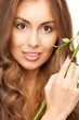 woman with green sprout