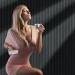 blond sensual lady with a cup coffee blond sensual lady with a cup coffee