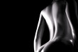 Plastic back woman on black background