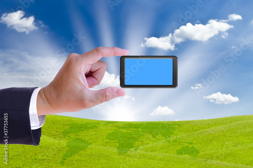 Photo: business hand holding mobile phone business hand holding mobile phone