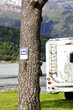 Motorhome parked alongside banning notice