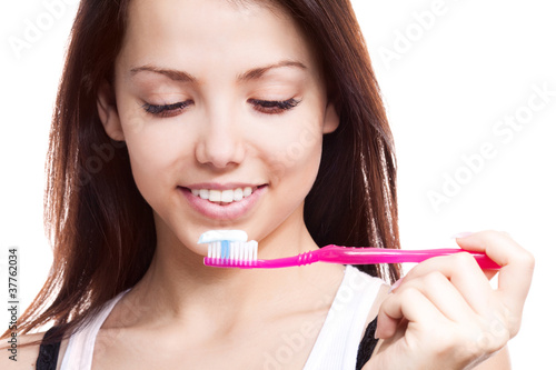Photo: woman brushing teeth woman brushing teeth