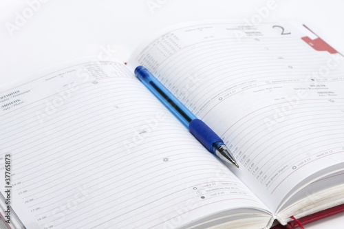 Photo: Notebook with pen Notebook with pen