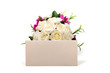 Photo en ligne au meilleur prix Bunch of roses and textured blank envelope isolated on white bac