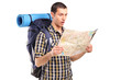 A lost hiker looking at map