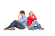 Couple sitting with their backs turned after having an argument
