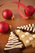 Tree cookies with red ribbon and baubles Tree cookies with red ribbon and baubles