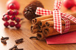 Cinnamon sticks with Christmas ornaments Cinnamon sticks with Christmas ornaments